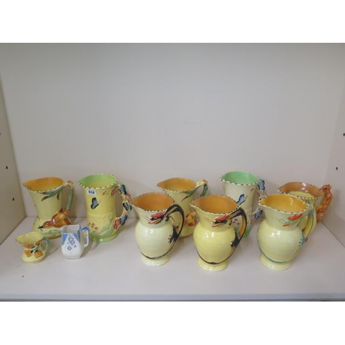 414 - Ten Burleigh ware jugs, six of which are damaged, the two small jugs- butterfly and kingfisher are g... 