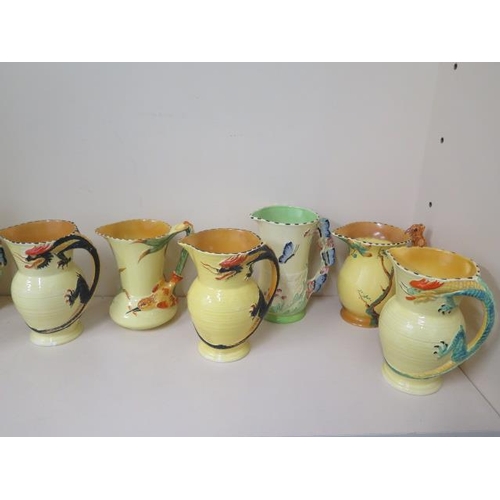 414 - Ten Burleigh ware jugs, six of which are damaged, the two small jugs- butterfly and kingfisher are g... 