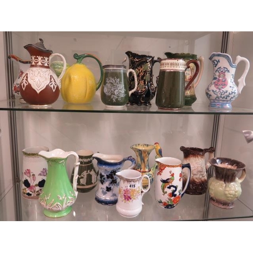 415 - A collection of 17 Victorian and later jugs