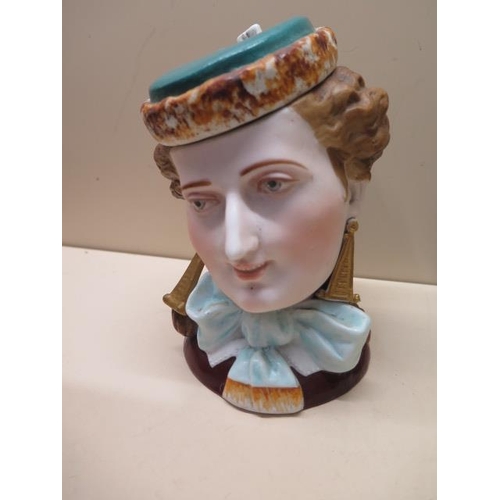 417 - A porcelain pot modelled as a ladies head, 19cm tall, some minor wear but generally good