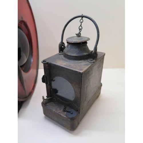 430 - A Railway train or buffer lamp with burner, 55cm tall, with age related wear, paintwork appears orig... 