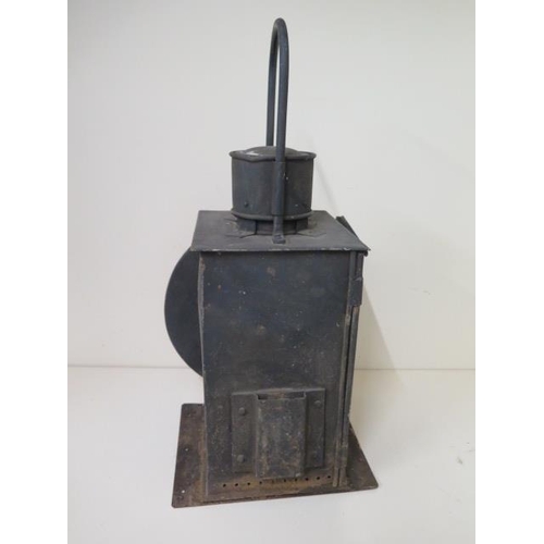 430 - A Railway train or buffer lamp with burner, 55cm tall, with age related wear, paintwork appears orig... 