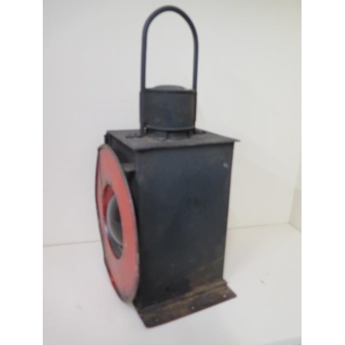 430 - A Railway train or buffer lamp with burner, 55cm tall, with age related wear, paintwork appears orig... 