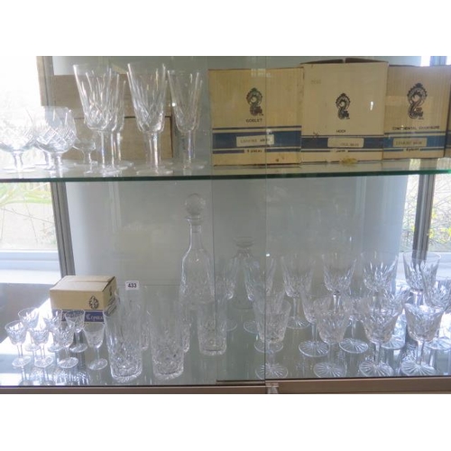 433 - Lismore Waterford glass; a collection of drinking glasses and two decanters, all good condition with... 