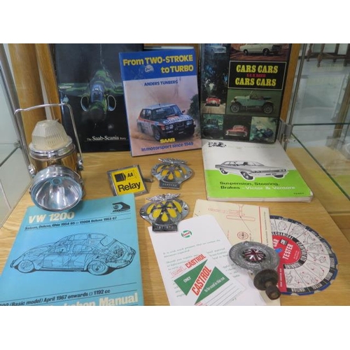 437 - Motoring Interest: VW workshop manual books, an early RAC badge, three AA badges and a motorist lamp