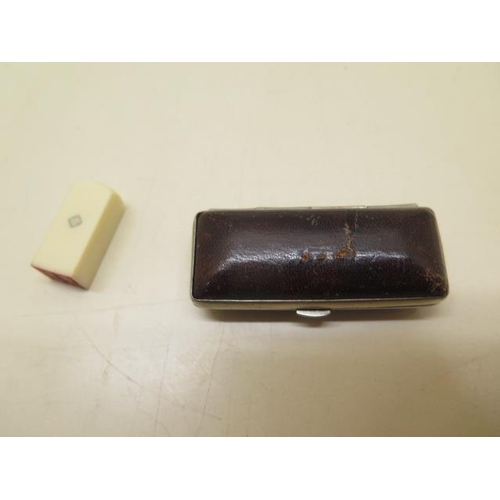 446 - A Chinese 19th century ivory small seal in original leather box, length 3cm, some wear to top of box... 