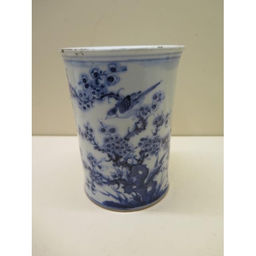 451 - A Chinese 18th century blue and white bitong (brush pot), well decorated with a bird amongst foliage... 