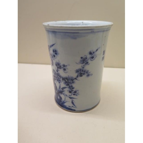 451 - A Chinese 18th century blue and white bitong (brush pot), well decorated with a bird amongst foliage... 