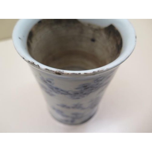 451 - A Chinese 18th century blue and white bitong (brush pot), well decorated with a bird amongst foliage... 