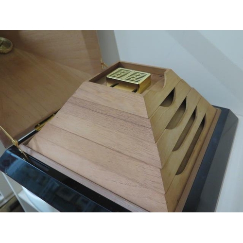 452 - A pyramid humidor with five internal trays, 33cm tall 45cm x 45cm