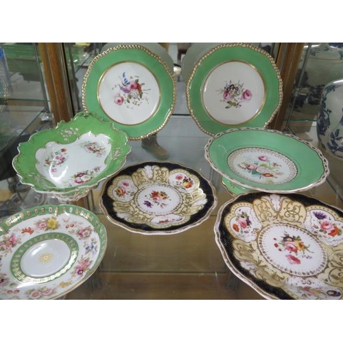 455 - A collection of 19th century ceramic tableware, all hand decorated, 16 pieces with a spare saucer, v... 