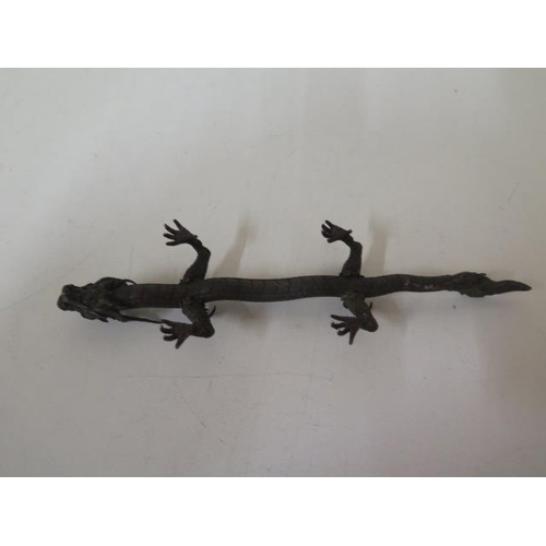 473 - A bronze dragon, 15cm long