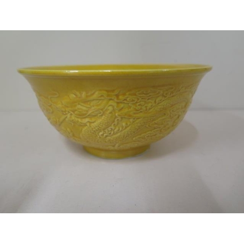 482 - A yellow glaze dragon bowl, 7cm tall x 15cm diameter, in good condition