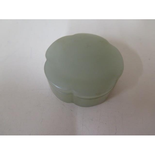 484 - A jade lidded pot, 2cm x 8cm, in good condition