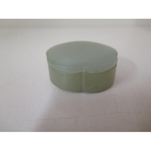 484 - A jade lidded pot, 2cm x 8cm, in good condition