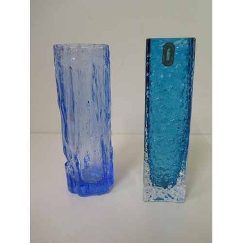 487 - A blue and clear Whitefriars glass vase, 17cm tall, and a bark effect glass vase, both in good condi... 