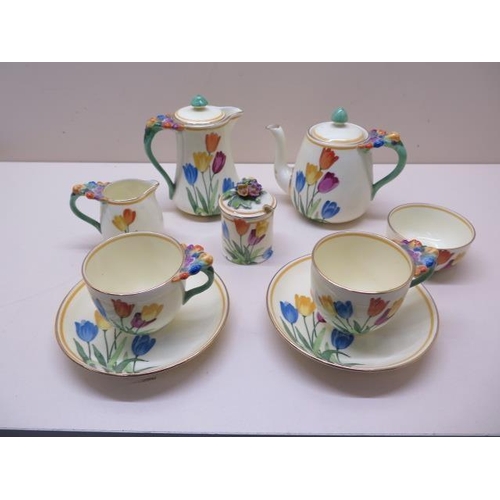 493 - A Crown Staffordshire tete a tete teaset with preserve pot and toast rack, all good apart from the w... 