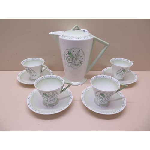 498 - A Shelley part tea service with triangular handles 4 cups 4 saucers and a coffee pot - some crazing ... 