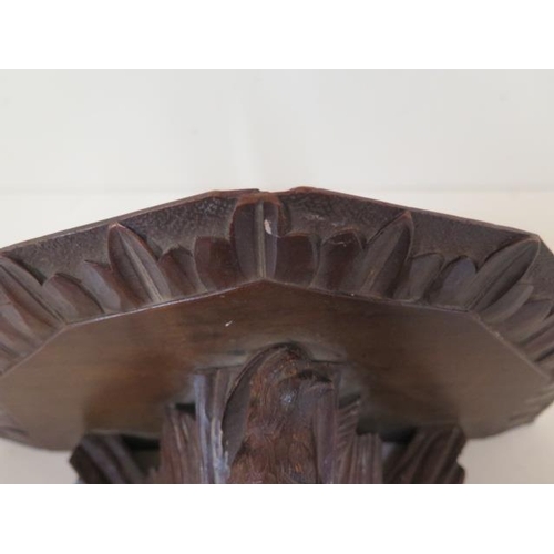 519 - A Victorian carved Black Forest wall bracket featuring a pair of pheasants, 23cm wide x 19cm deep, m... 