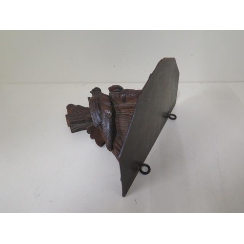 519 - A Victorian carved Black Forest wall bracket featuring a pair of pheasants, 23cm wide x 19cm deep, m... 