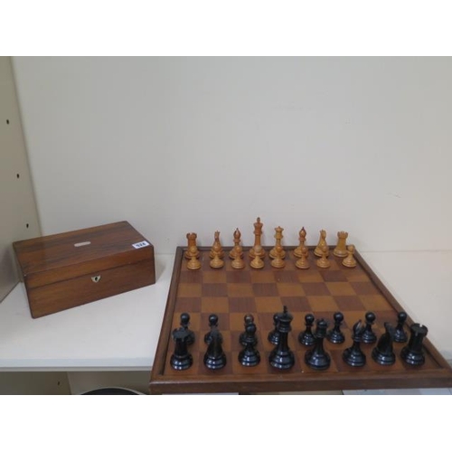 524 - A weighted chess set and board, height of King 10.5cm, board 47cm x 47cm, all good apart from slight... 