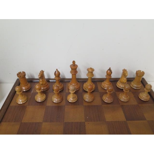 524 - A weighted chess set and board, height of King 10.5cm, board 47cm x 47cm, all good apart from slight... 