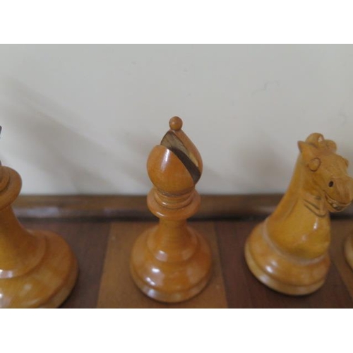 524 - A weighted chess set and board, height of King 10.5cm, board 47cm x 47cm, all good apart from slight... 