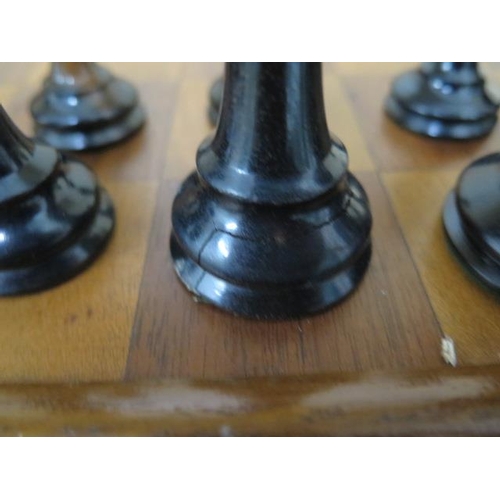 524 - A weighted chess set and board, height of King 10.5cm, board 47cm x 47cm, all good apart from slight... 