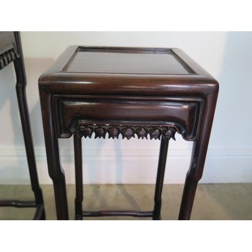 57 - A nest of three Oriental carved sidetables in good sturdy condition, minor cracking to tops, 67cm ta... 