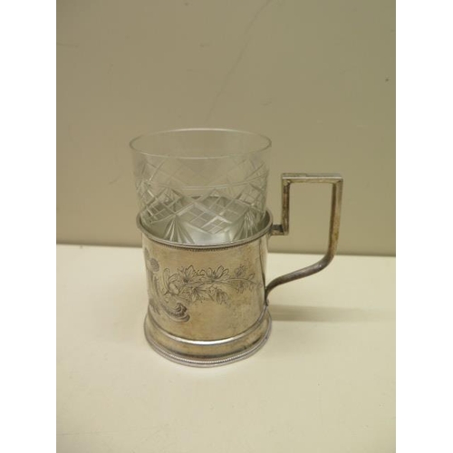 605 - A Russian silver tea glass holder, hallmarked to base and stamped 84, approx weight 3.7 troy oz, als... 