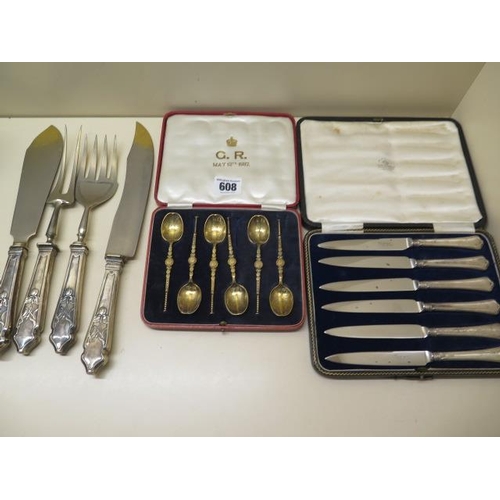 608 - A set of six silver gilt King George VI coronation spoons together with silver handled fruit knives ... 