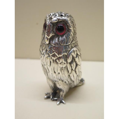 618 - A Victorian novelty silver owl pepper by George Richard and Edward Brown London 1862/3, 10cm tall, a... 