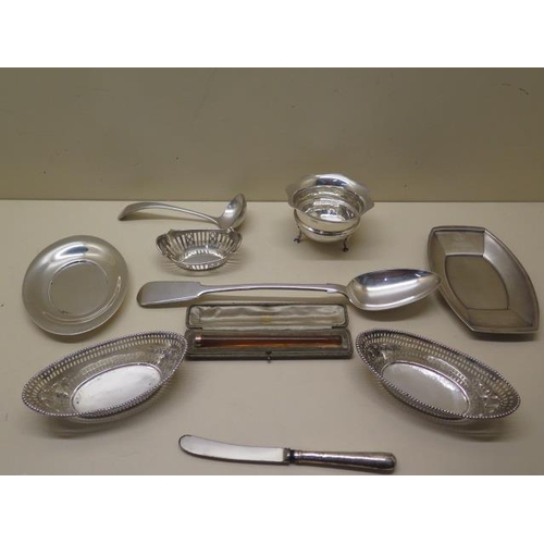 623 - A collection of silver. A pair of Victorian bonbon baskets, an Edwardian Chester wavy edged bowl, a ... 