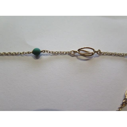 708 - A hallmarked 9ct yellow gold and green stone necklace, 43cm long, approx 5.3 grams, clasp working, i... 