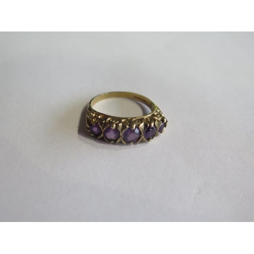 710 - A 9ct hallmarked yellow gold amethyst five stone ring, size P, approx 3.9 grams, in generally good c... 