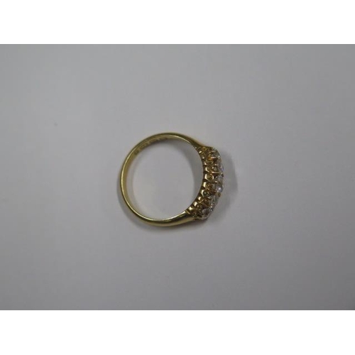 715 - A hallmarked 18ct yellow gold diamond 5 stone ring, size O/P, the central diamond approx 0.23ct, goo... 