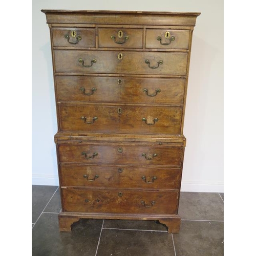 72 - A George 1st walnut chest on chest with three small drawers, over a  brushing slide and three furthe... 