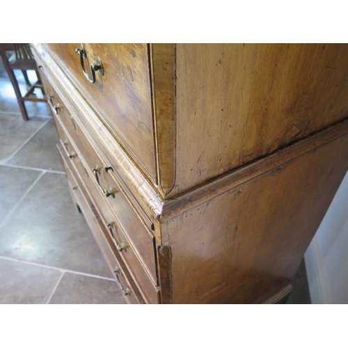 72 - A George 1st walnut chest on chest with three small drawers, over a  brushing slide and three furthe... 