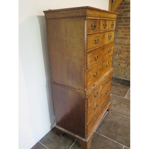 72 - A George 1st walnut chest on chest with three small drawers, over a  brushing slide and three furthe... 