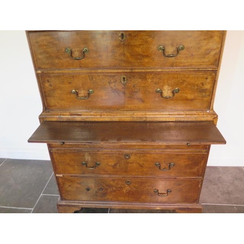 72 - A George 1st walnut chest on chest with three small drawers, over a  brushing slide and three furthe... 