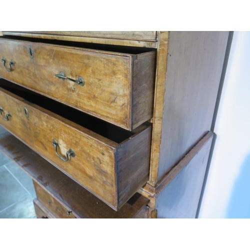 72 - A George 1st walnut chest on chest with three small drawers, over a  brushing slide and three furthe... 