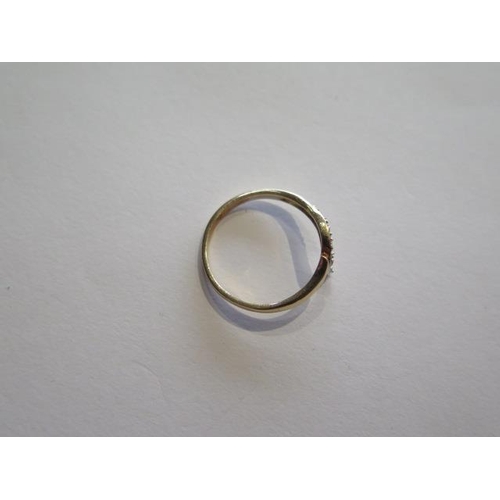 722 - A 9ct yellow gold diamond ring, not hallmarked but old, test mark to inside of shank, size N, approx... 