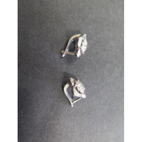 723 - A pair of 14ct white gold diamond cluster earrings, 10mm x 10mm, approx 5.6 grams, in good condition... 