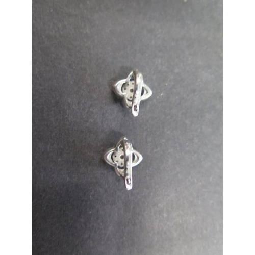 723 - A pair of 14ct white gold diamond cluster earrings, 10mm x 10mm, approx 5.6 grams, in good condition... 