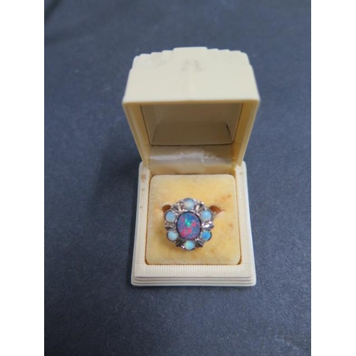 731 - A 9ct yellow gold Australian lightening ridge opal ring in original Australian casecraft Art Deco ba... 