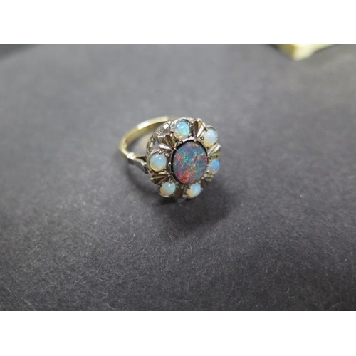 731 - A 9ct yellow gold Australian lightening ridge opal ring in original Australian casecraft Art Deco ba... 