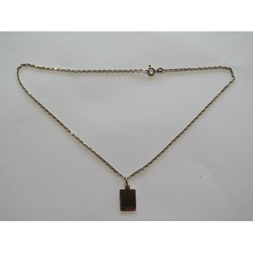 734 - A hallmarked 9ct yellow gold dog tag on a yellow gold hallmarked 42cm chain, approx 5.8 grams, in go... 