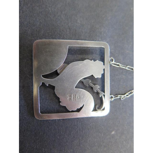 738 - A Georg Jensen sterling silver cockerel pendant on chain, 62cm long, pendant 38mm wide, No; 96, desi... 