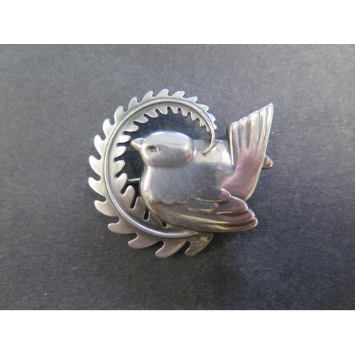 742 - A Georg Jensen sterling silver robin brooch designed by Arno Malinowski, 50mm wide at widest part, n... 