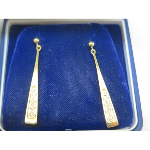 748 - A pair of 18ct gold and diamond Clogau drop earrings, 4cm long, approx 4.4 grams in good condition